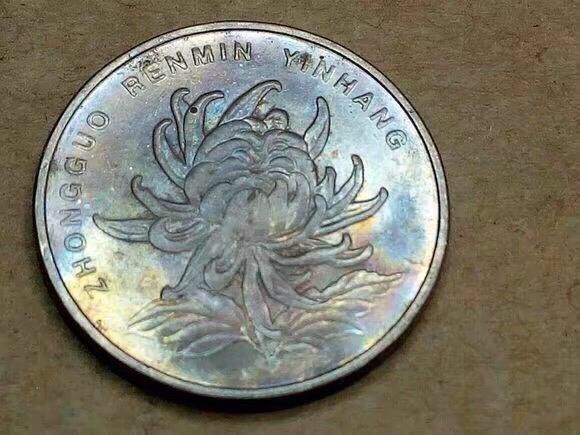 七彩币(七彩币图片及价格) 七彩币(七彩币图片及价格)